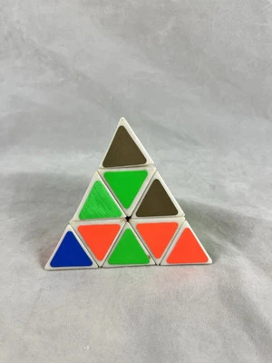 TOMY Pyraminx Twist Pyramid Puzzle Rubiks Cube Brain Teaser Game Vintage 1980s - Image 1 of 4