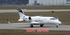 PHOTO AEROPLANE M-ABRB - LEARJET 45 - RYANAIR STN 280123 A AT LONDON STANSTED - Picture 1 of 1
