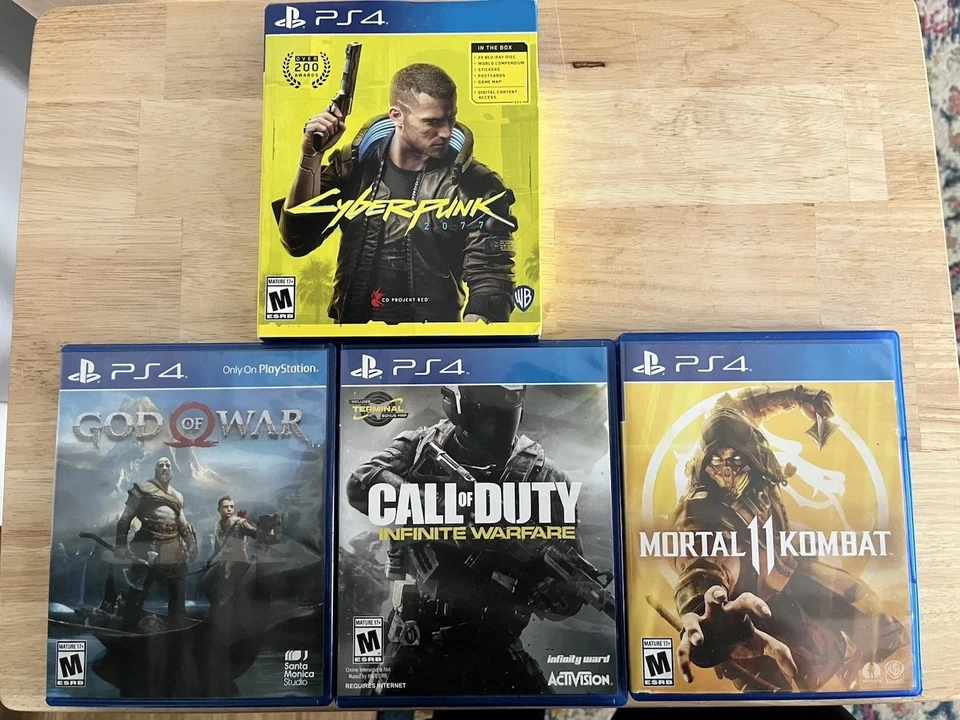 Lote de juegos PS4 - Cyberpunk, God of War, MK11, Call of Duty Foto 1 de 4