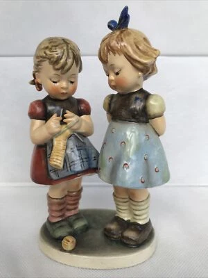 Hummel 256 Knitting Lesson TMK4 Girl Watching Another Knit 7 1/2” Tall - Image 1 of 4