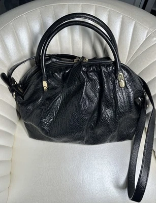 Bolso de mano Nina Ricci para mujer de cuero negro con doble asa con correa para el hombro Foto 1 de 4