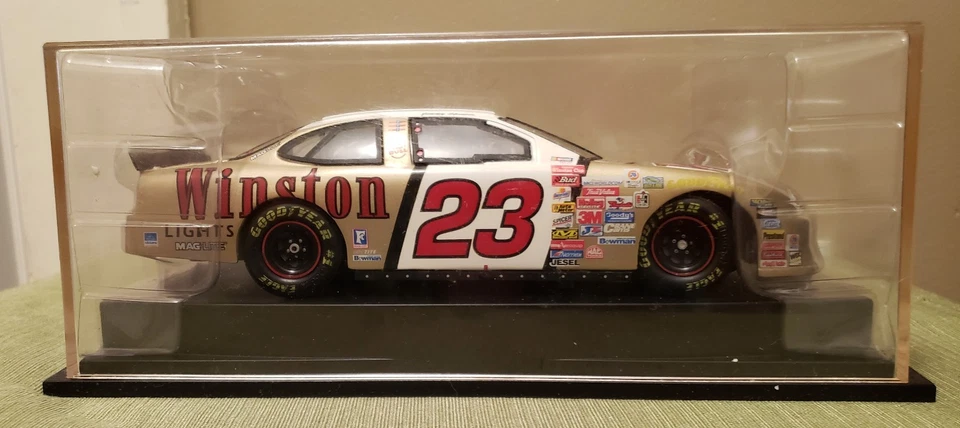 1999 Ford Taurus (запечатанный чехол) #23 Джимми Спенсер с сертификатом подлинности + оригинальная коробка - LIM ED. - Изображение 1 из 4