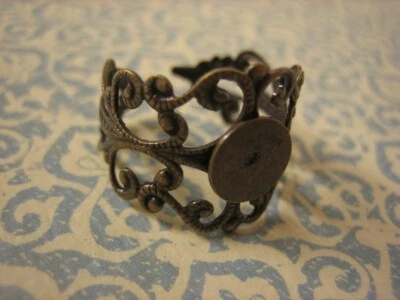 Anillos de filigrana de latón antiguos en blanco 100 piezas anillos para bricolaje almohadilla en blanco de 10 mm anillos de latón Foto 1 de 2