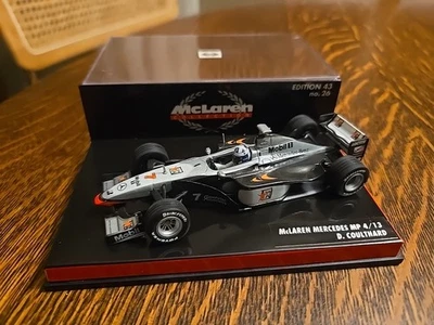 MINICHAMPS 1:43 McLAREN MERCEDES MP4/13 D. COULTHARD MC#26 "West" - Image 1 of 4