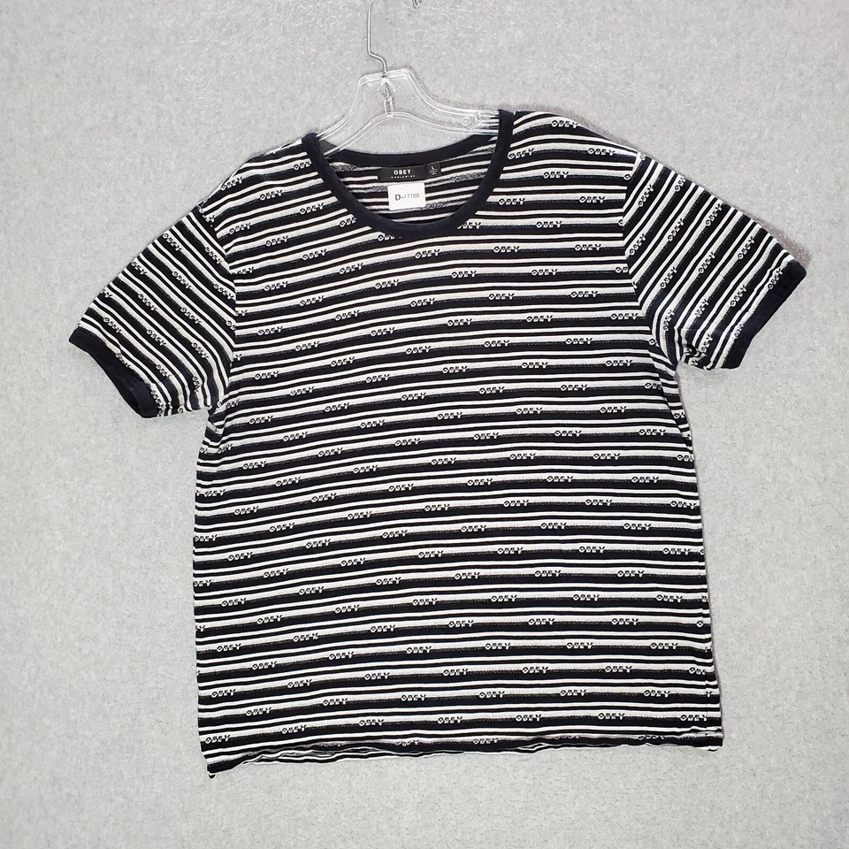 Camisa Obey Mujer Top Grande Negra Rayas Logo AOP Timbre Cuello Redondo Manga Corta Foto 1 de 4