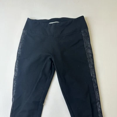 Leggings Mudd para mujer medianos negros FLX elásticos 24/7 imitación cuero ribete bolsillos Foto 1 de 4