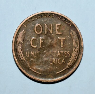 126q. A 1934 P LINCOLN WHEAT CENT WITH A STRUCK THROUGH ERROR ON REVERSE - Image 1 of 2