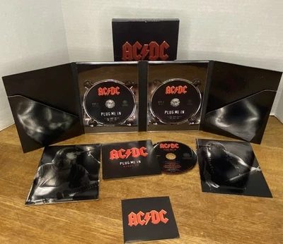 AC/DC Plug Me In 3-Disc DVD Box Set Bonus CD 2007 Columbia Complete w/ Inserts - Image 1 of 4