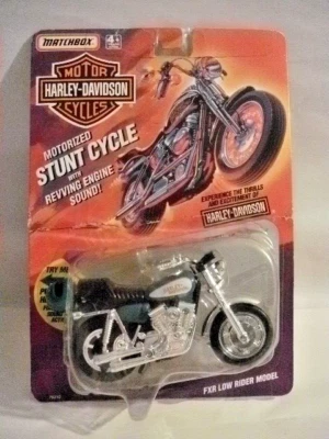 MATCHBOX HARLEY MOTORIZED STUNT CYCLE REVVING ENGINE SOUND TEAL DAMAGE BOX 76210 - Image 1 of 4