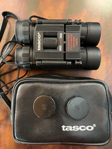 TASCO COMPACT BLACK BINOCULARS, 10X25, 294 FT/1000YDS, COATED OPTICS, CASE+CAPS - Picture 1 of 7