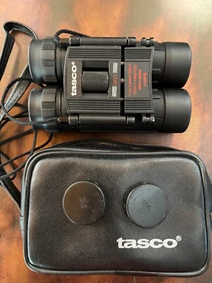 TASCO COMPACT BLACK BINOCULARS, 10X25, 294 FT/1000YDS, COATED OPTICS, CASE+CAPS - Image 1 of 4