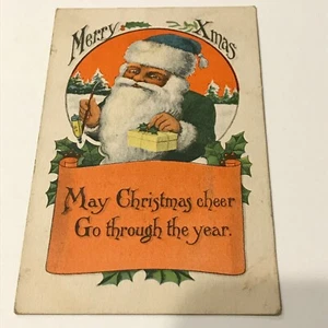 Antique 1913 Green coat Santa Claus Pipe smoking xmas postcard - Picture 1 of 2