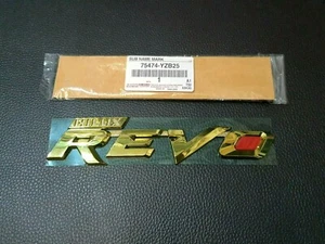 NEW GOLD REVO  LOGO EMBLEM BADGE FOR HILUX REVO 2015-2025 M70 M80 - Picture 1 of 7