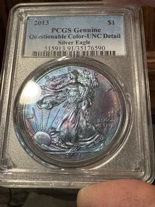 2013 $1 PCGS Genuine Questionable Color- UNC Detail Silver Eagle - Picture 1 of 2