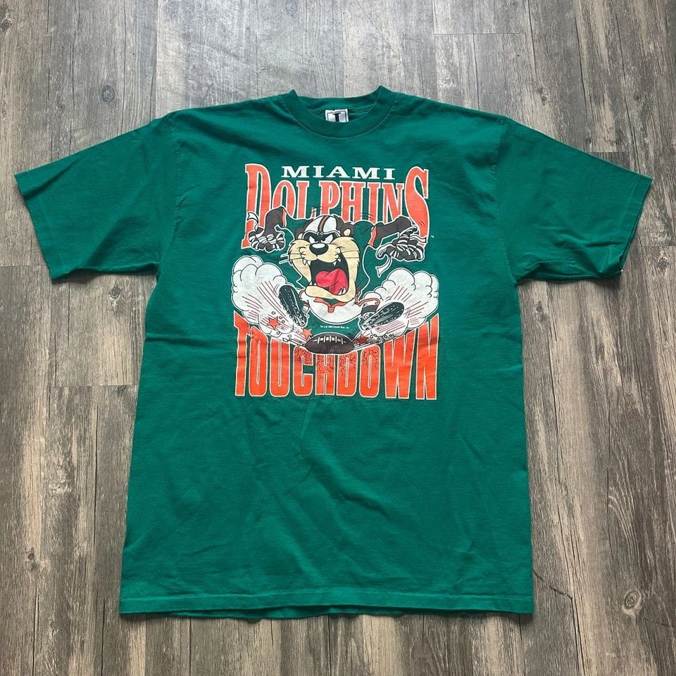 Camiseta Unisex Manga Corta Gráfica Touchdown Taz Miami Dolphins Rara HN2829 Foto 1 de 1