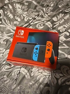 NEW Nintendo Switch + Neon Joy Cons 32GB Gaming Console - Picture 1 of 3