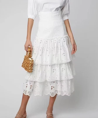 Falda midi Alexis Faustine con volantes bordado inglés algodón blanca en capas medianas Foto 1 de 4