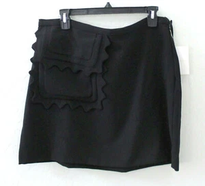 Minifalda Victoria Beckham X Target sarga ribete vieira bolsillo talla L negra - Imagen 1 de 3