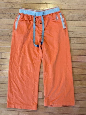 Pantalones deportivos Psycho Bunny naranja para hombre L 34 con rayas laterales tostadas Foto 1 de 2