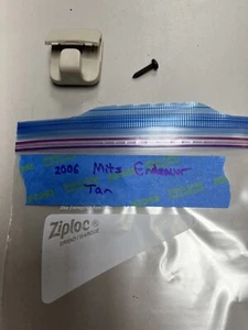 2004-2011 Mitsubishi Endeavor OEM Sun Visor Clip Gray 04 05 06 07 08 09 10 11 - Picture 1 of 1