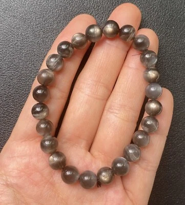 Pulsera elástica cuentas redondas energéticas ojo de gato piedra solar negra natural 8 mm Foto 1 de 4