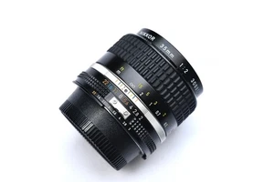 Nikon Objektiv Nikkor 35mm 1:2 Ais in schönem Zustand - Bild 1 von 4