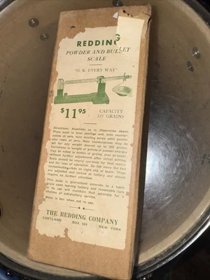 Báscula en polvo y bala Foto 1 de 2