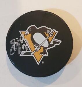 SIDNEY CROSBY SIGNED PENGUINS PUCK, PENGUINS AUTHENTOCITY STICKER ON THE BACK.