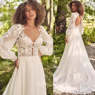 Vestidos de novia boho de encaje de gasa mangas largas línea A vestidos de novia longitud de fregar Foto 1 de 4