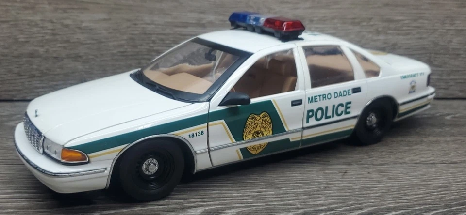 UT Models 1996 Chevrolet Caprice Metro Dade Florida Police 1/18 Diecast Car - Image 1 of 4