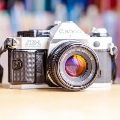 Canon AE-1 Program + 50mm f/1.8 FD + Pile Neuve AE1 !! Super Offre !! - Immagine 1 di 4