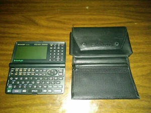 *PIÈCES OU RÉPARATION* Sharp OZ-630 Wizard 256 Ko organisateur personnel de poche PDA et étui - Photo 1 sur 12