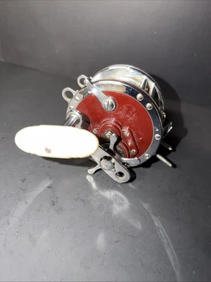 Vintage Penn Master Mariner Silver & Maroon Fishing Reel 349 - Image 1 of 4