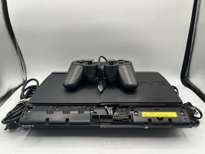 Consola Sony PlayStation 3 Super Slim PS3 12 GB con mando y cables funciona Foto 1 de 4