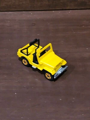 Tomica #57 Mitsubishi H-J58 Jeep 4x4 желтый - масштаб 1:57 - Изображение 1 из 2