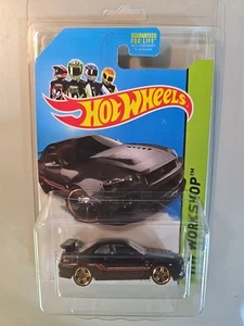 Estuche protector gratuito Hot Wheels Nissan Skyline GT-R (R34) 2014 negro HW taller - Imagen 1 de 6