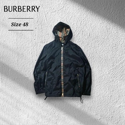 Jaqueta de náilon Burberry cordão Nova Check preta boro - Imagem 1 de 4
