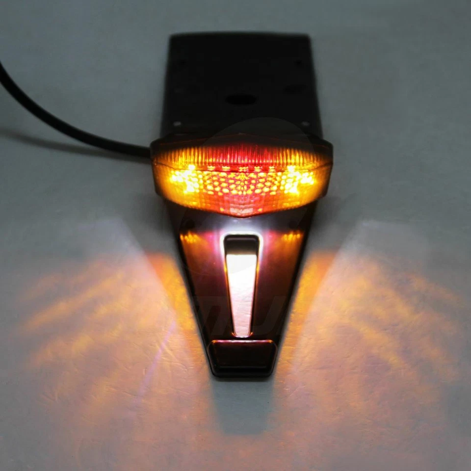 Luz trasera de freno LED universal para moto de cross luz de señal de giro lámpara EE. UU. Foto 1 de 4