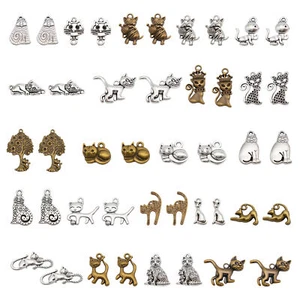 10 pares de lotes mixtos de aleación mascota gato gatito dijes joyería hágalo usted mismo colgante animal - Imagen 1 de 7