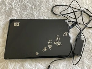 HP Pavilion dv7 Notebook PC AMD Turion 11 Dual-Core Mobile M520 2.30 GHz 64 bit - Picture 1 of 4