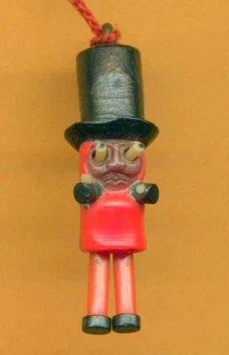 Dije Kobe japonés de celuloide vintage ojos emergentes hombre con piernas colgantes Foto 1 de 3