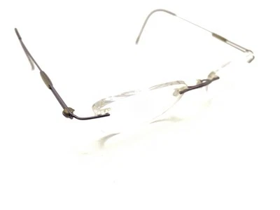 Monturas de gafas Silhouette titanio púrpura ovaladas sin montura Austria hombres mujeres Foto 1 de 4