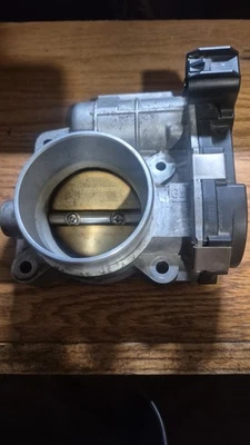 07-11 Saab 9-3 parte do corpo do acelerador de fábrica # 55354710 - Imagem 1 de 3