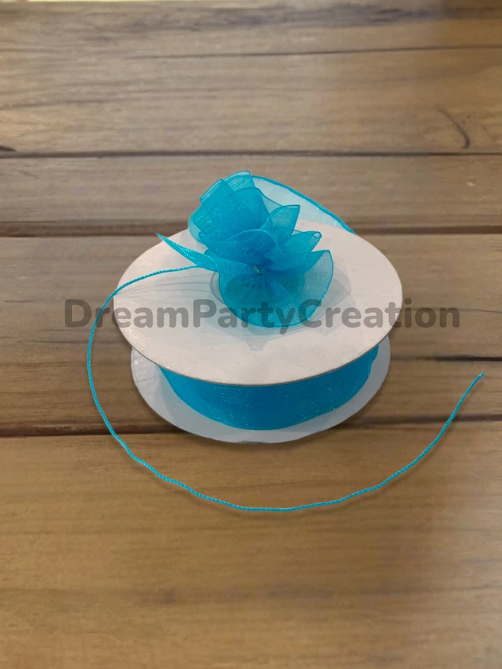 Cinta de organza lisa de 7/8" (TURQUESA) LAZO CON VOLANTES 25 yardas Foto 1 de 1