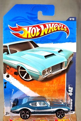 Hot Wheels #109 Muscle Mania 9/10 Olds 442 2011 verde con ruedas de radios MC5 cromadas Foto 1 de 4