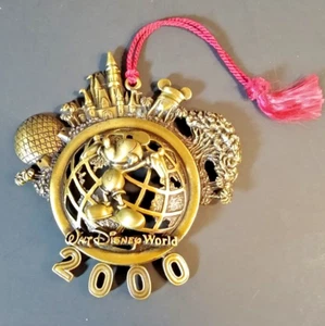 Disney World 2000 Brass colored Ornament light wear to finish - Picture 1 of 9