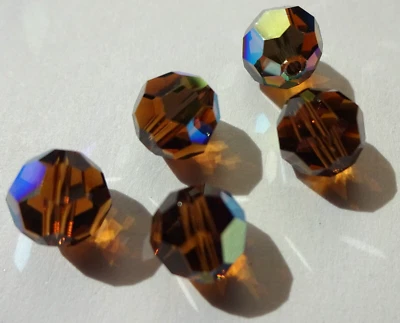 Cristal de Swarovski 6 mm (360 piezas) topacio ahumado AB #5000 Foto 1 de 3