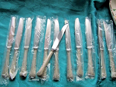 12 couteaux de table en métal argenté Saint Medard modèle Mozart - Photo 1/4