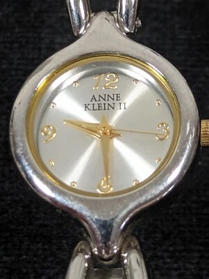 Reloj pulsera Anne Klein esfera tono plata caja redonda tono plata correa 6,25 pulgadas Foto 1 de 4