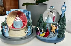 More details for 2x extremely rare disney cinderella’s midnight magic rotating snow globes